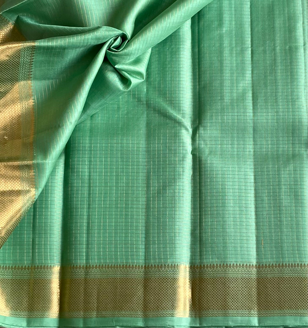 Seafoam Green Woven Diamond Saree With Gold Border Tassel Pallu