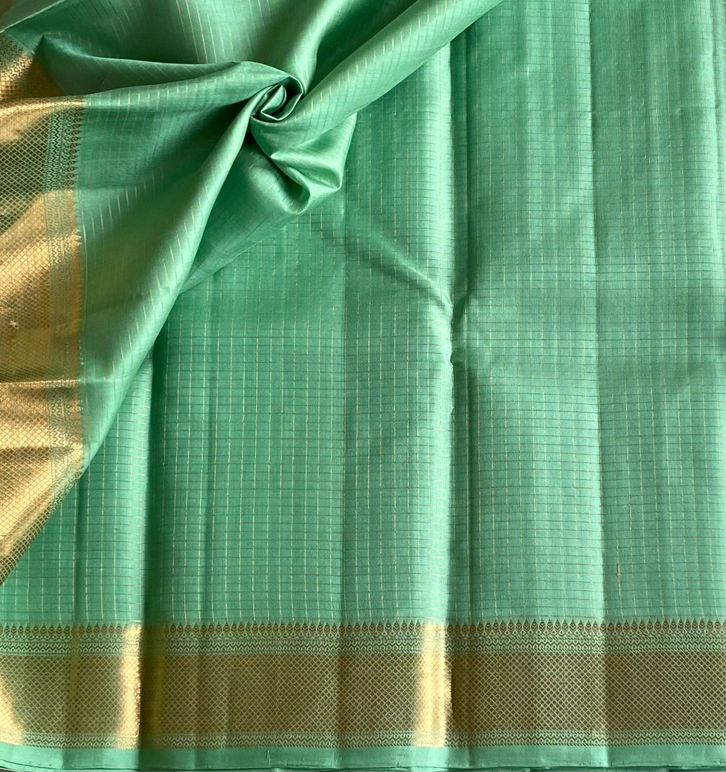 Seafoam Green Woven Diamond Saree With Gold Border Tassel Pallu