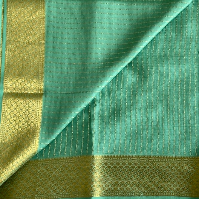 Dreamy Sea Blue Mysore Crepe Silk Saree With Metallic Gold Border