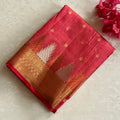Kanakambari pinkish coral Gold soft tussar silk with temple borders