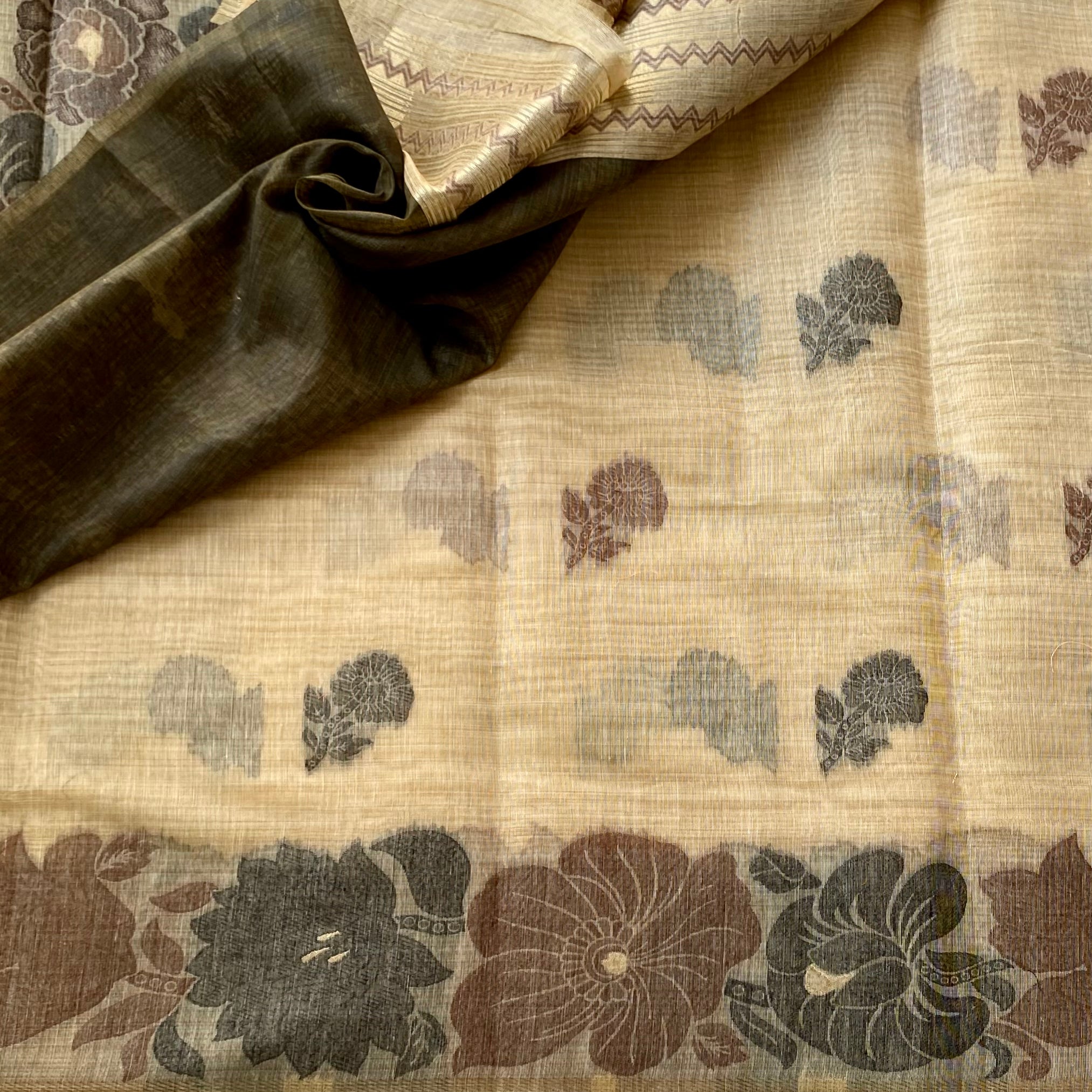 Muted Floral Linen Saree With Tassel Border Elegant Neutral Drapes