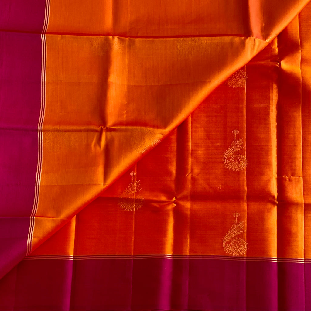 Sunset Orange Designer Pure Silk Saree With Rich Magenta Pink Pallu And Gold Zari