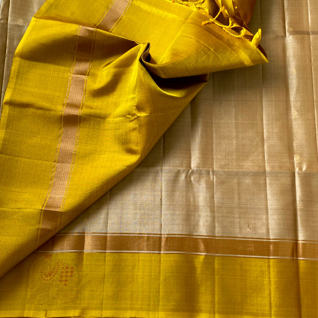 Shades of Beige • mango yellow on Designer pure silk that comes with elephant borders