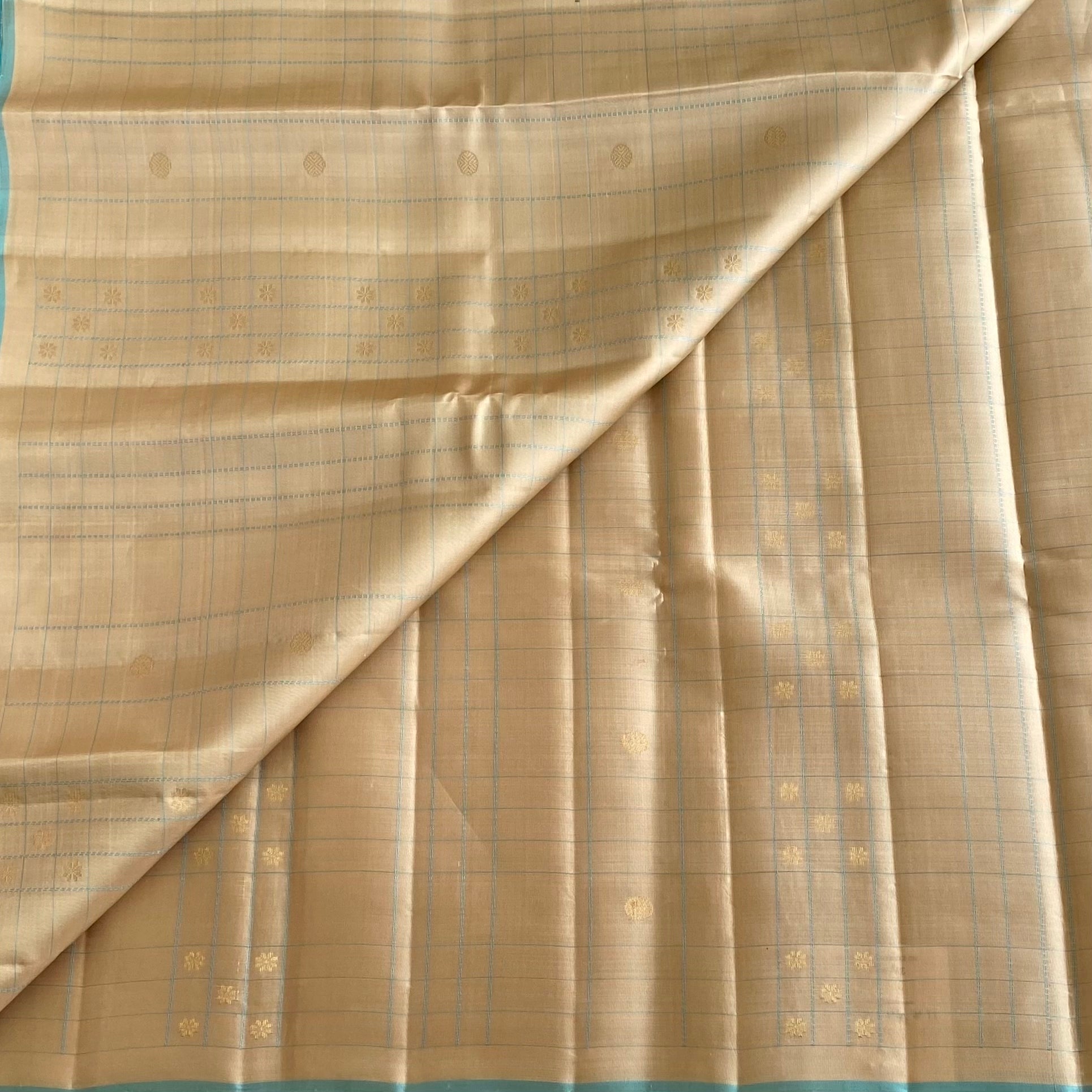 Subtle Gold Designer Pure Silk Saree With Turquoise Pallu And Gold Zari