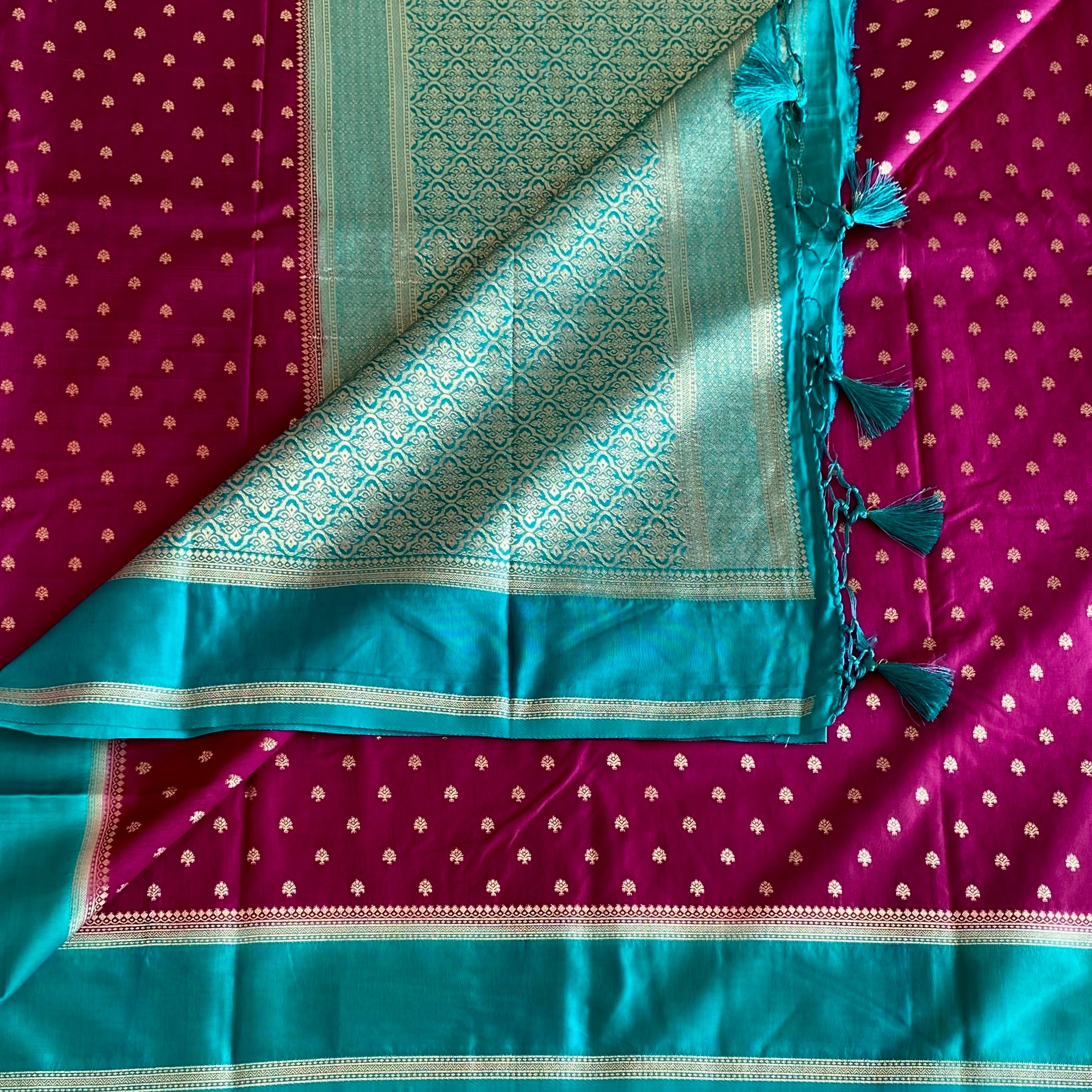 Elegant Magenta Teal Silk Saree Woven Zari Buti Tassel Border
