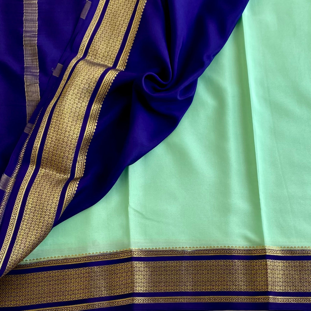 Sea Green With Rich Navy Blue Mysore Crepe Silk Saree With Antique Gold Borders