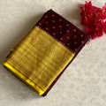 Deep Maroon & Mustard Yellow Banarasi Crepe Silk Saree With Zari Buttas