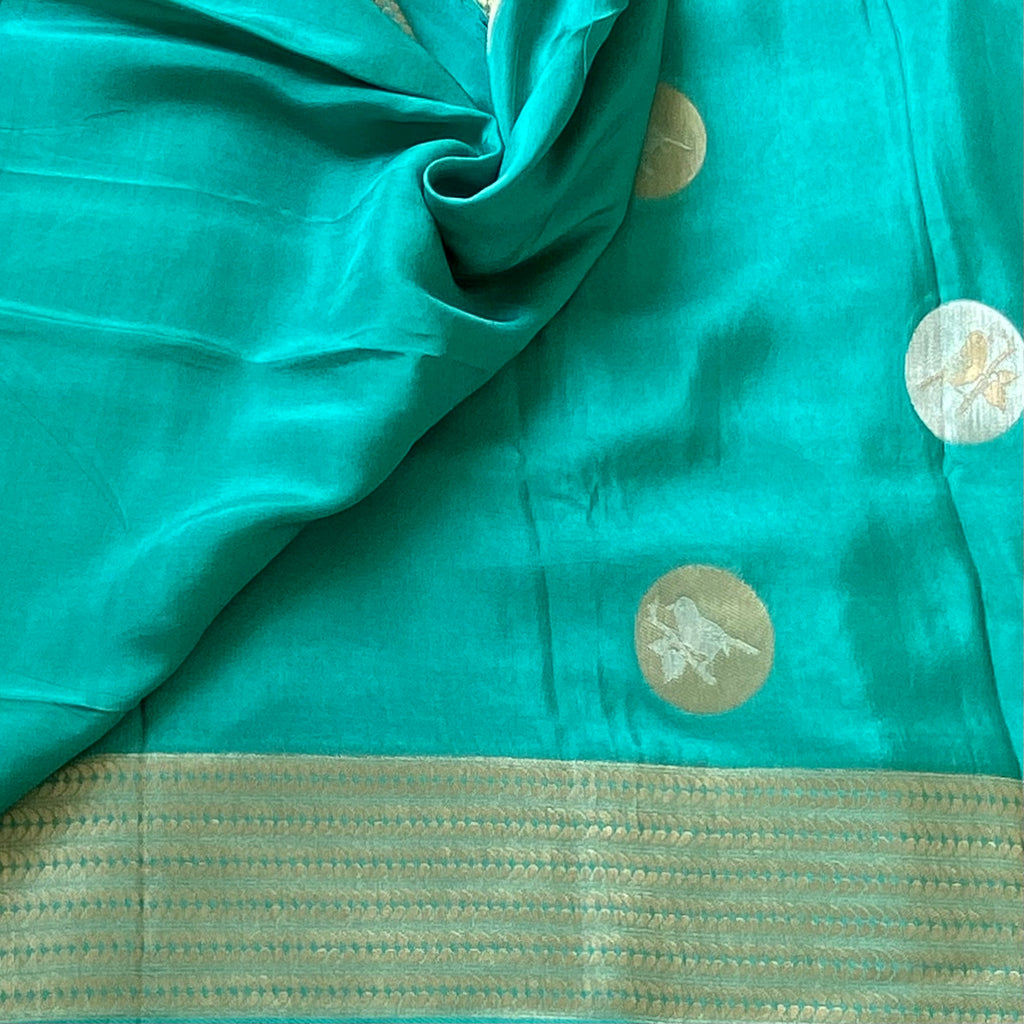 Gorgeous Sea blue designer soft crepe silk with zari buttas