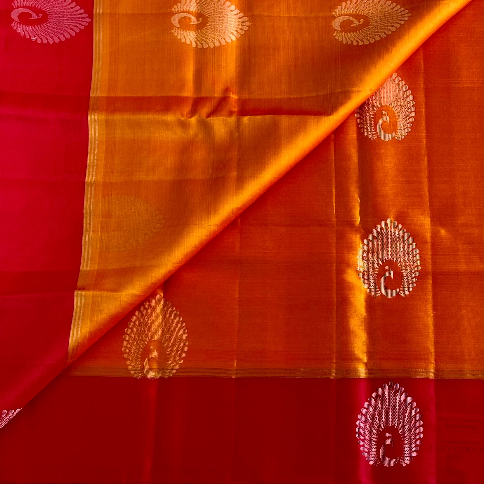 Sunset Orange Designer Pure Silk Saree With Crimson Red Border