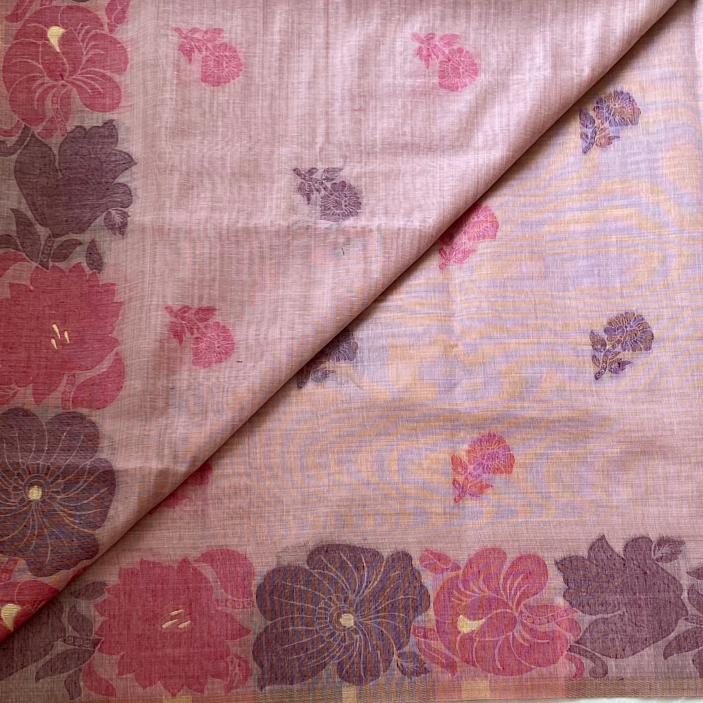 Pastel Mauve Floral Saree With Gold Zari Border And Tassels