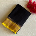 Jet Black Banarasi Crepe Silk Saree With Sunflower Yellow Pallu