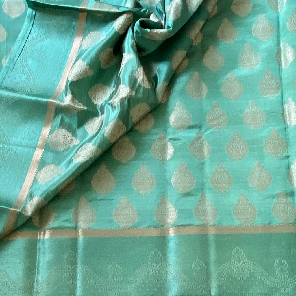 Mint Green Banarasi Silk Saree With Antique Gold Zari Border