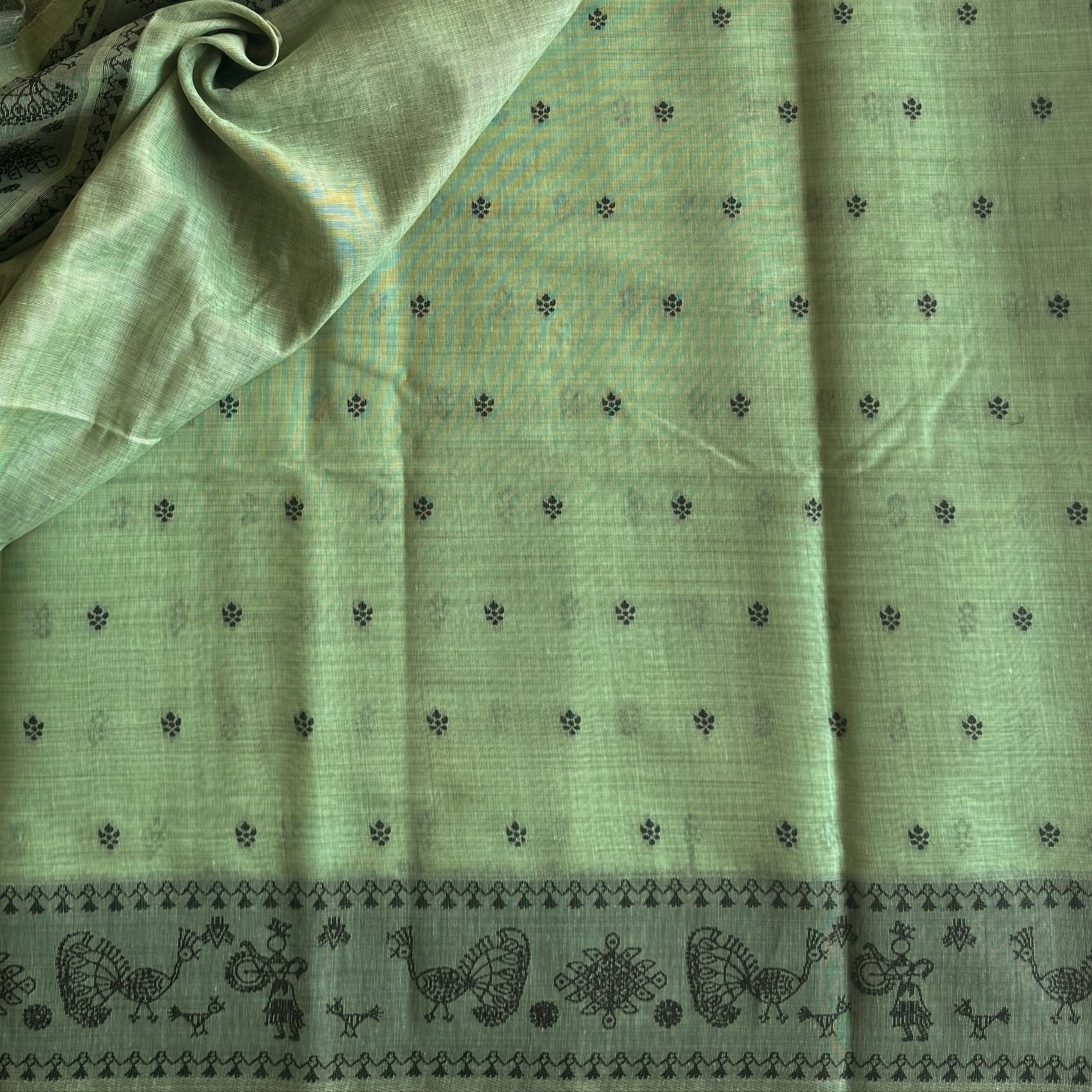 Mint Green Village Motif Saree With Peacock Border And Tassels