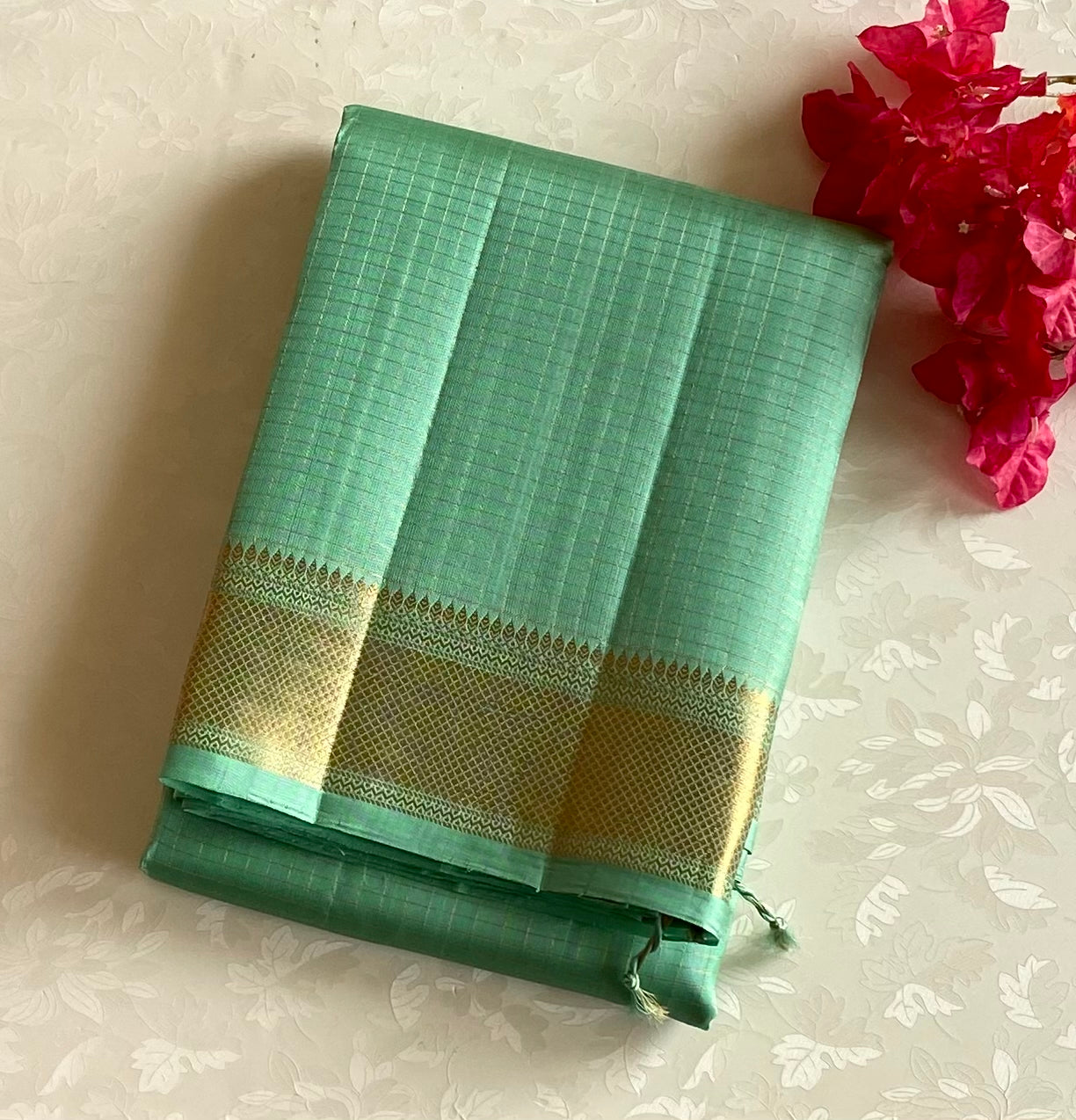 Seafoam Green Woven Diamond Saree With Gold Border Tassel Pallu