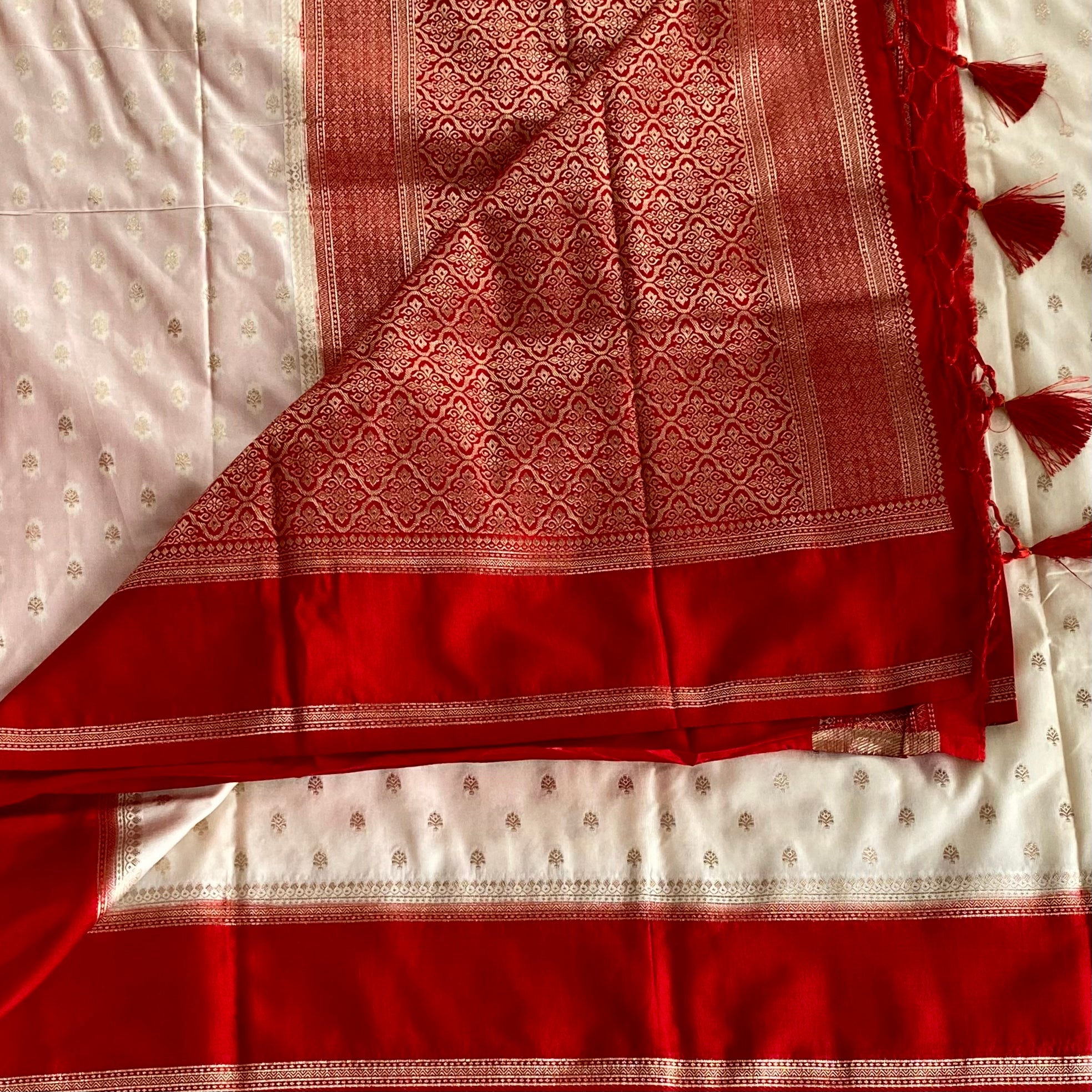Elegant Ivory Crimson Banarasi Silk Saree Gold Brocade Tassel Border