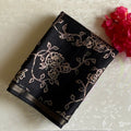 Jet Black Soft Tussar Silk Saree With Antique Gold Floral Pallu