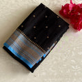 Jet Black Banarasi Crepe Silk Saree With Turquoise Blue Border