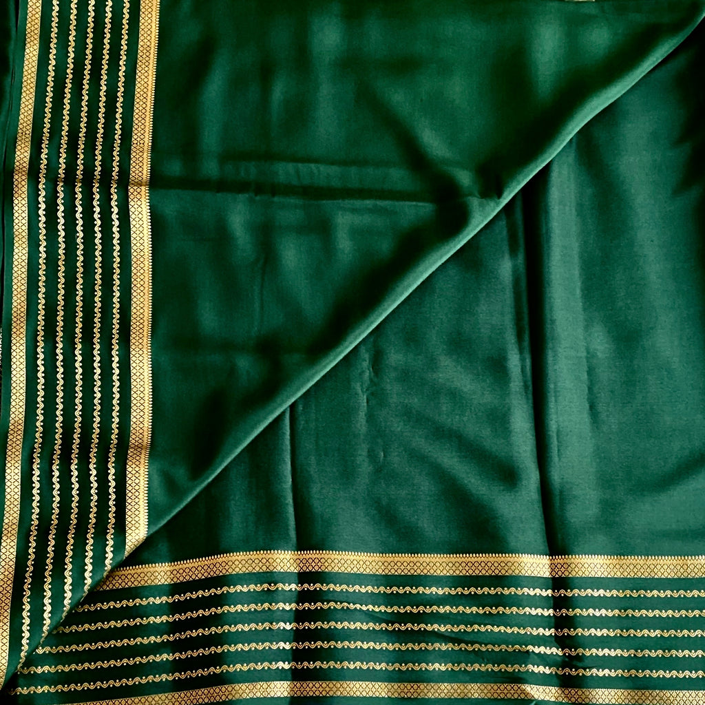Deep Teal Saree with Gold Zari Stripes and Patterned Border