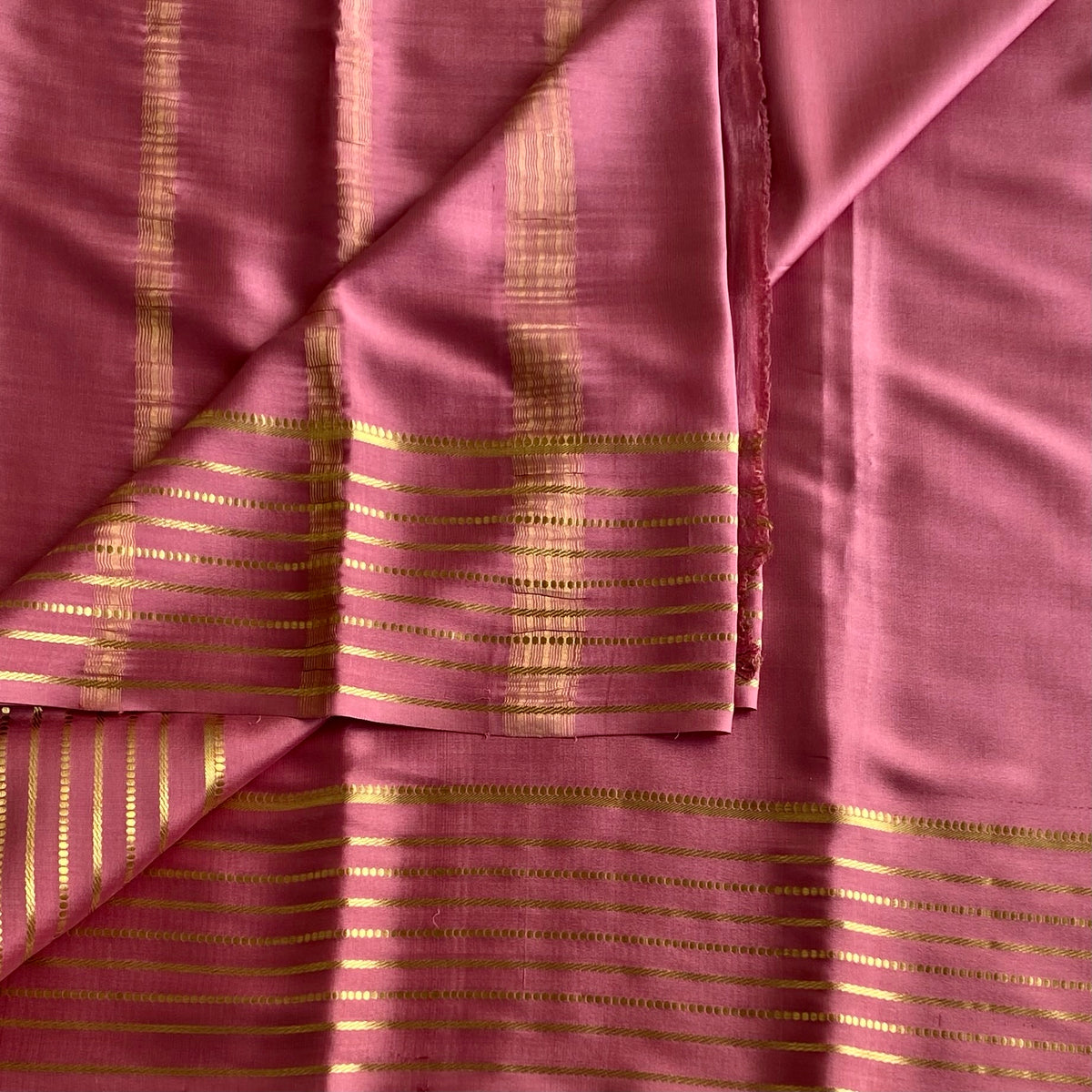 Metallic Rose Pink Mysore Crepe Silk Saree With Gold Striped Pallu And Border