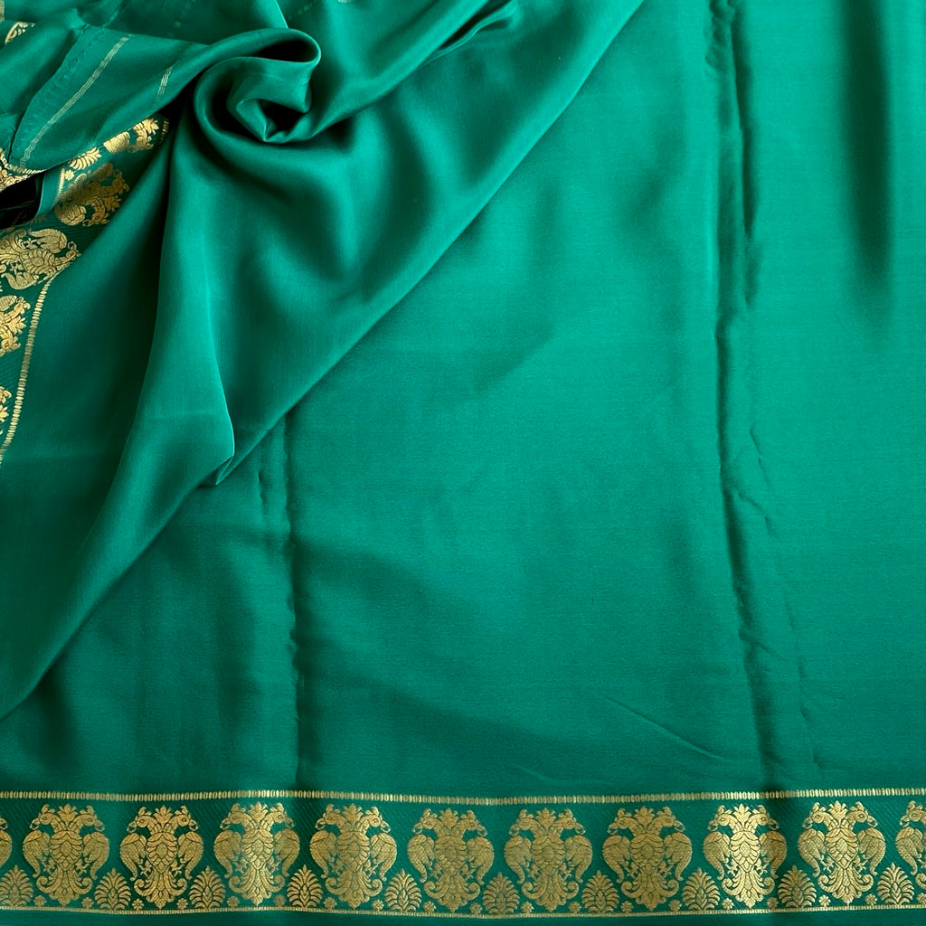 Teal Green With GandaBerunda Borders Pure Mysore Silk