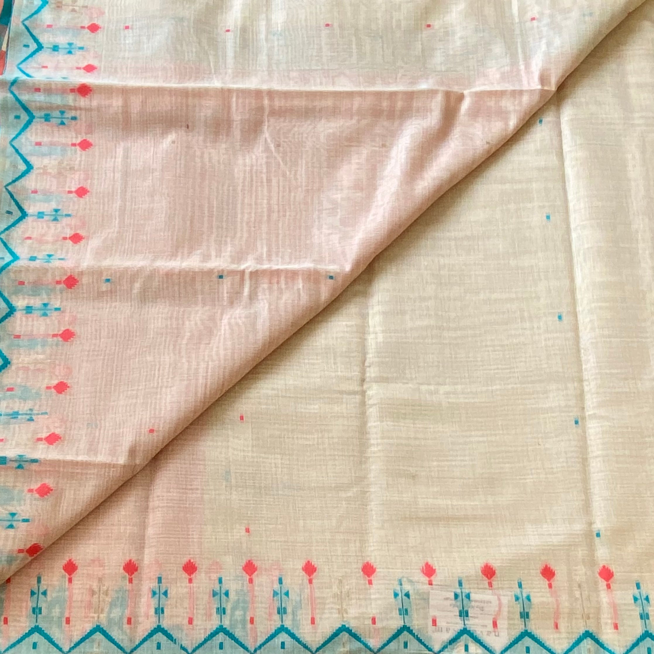 Pastel Pink Beige Saree Turquoise Zigzag Border Tassel Ikat Design