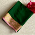Emerald Green Mysore Crepe Silk Saree With Pastel Pink Pallu Gold Border