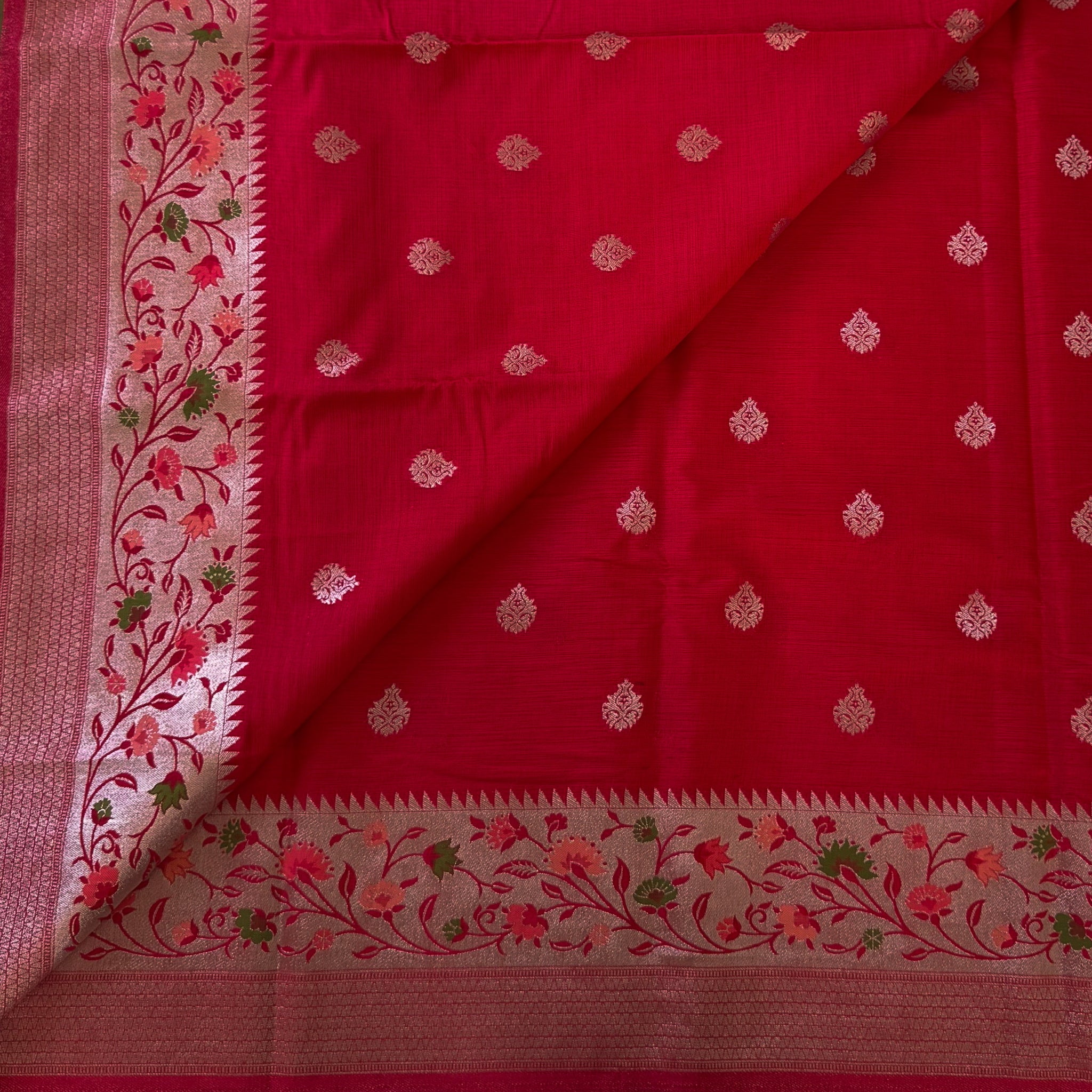 Fuchsia Brocade Silk Saree With Golden Floral Pallu And Tassels