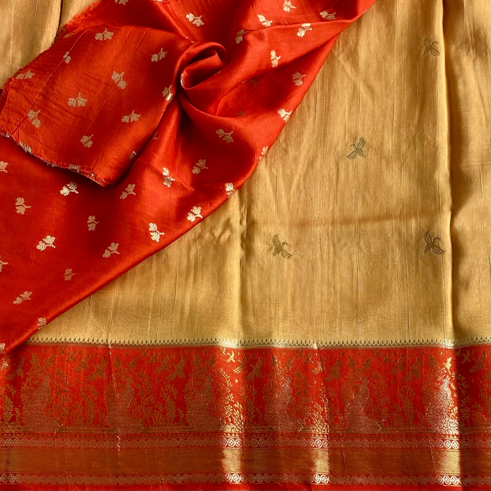 Yuma Antique Gold Soft Tussar Silk Saree With Vermilion Red Pallu