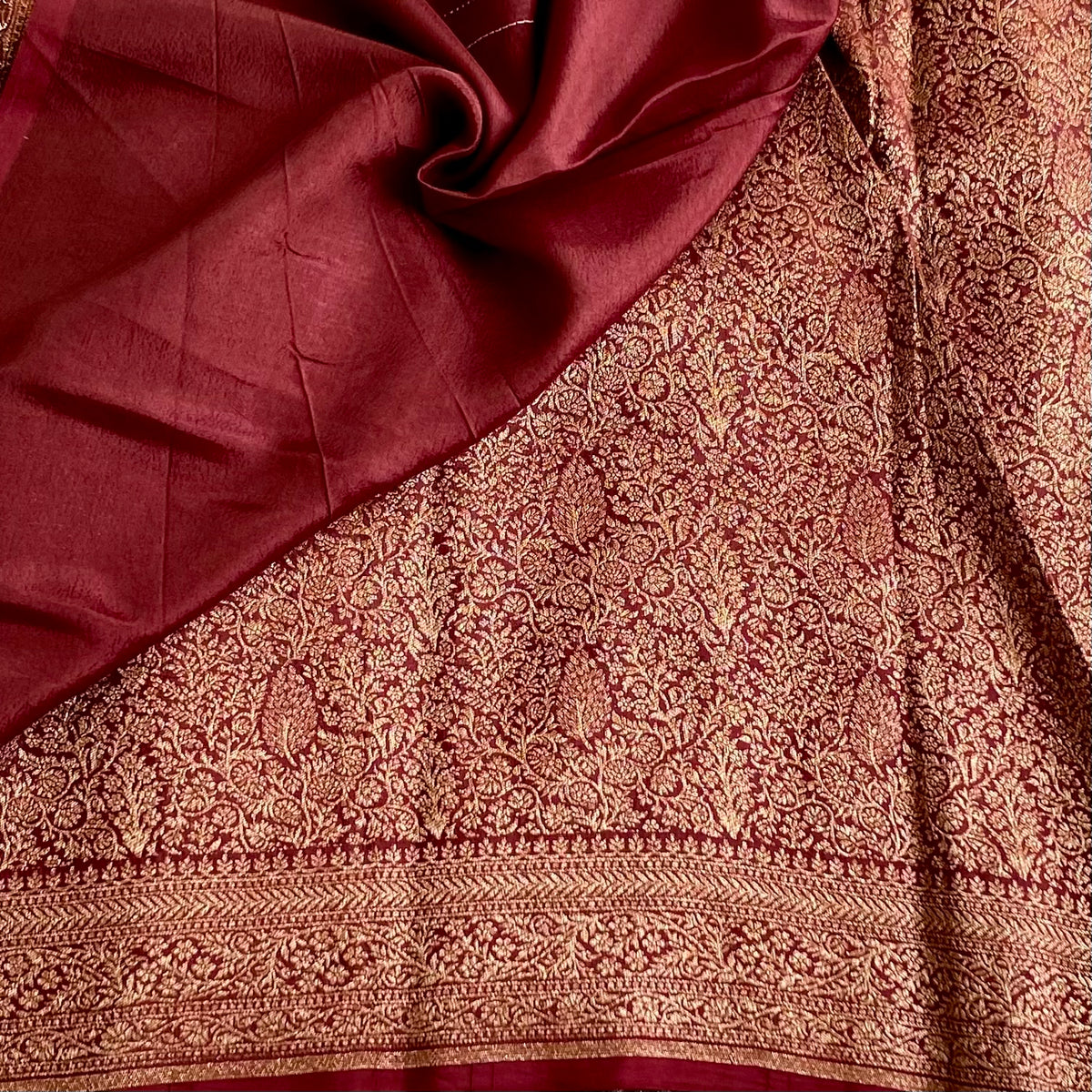 Banarasi Crepe Silk Deep Wine Maroon Saree With Metallic Gold Zari Woven Border