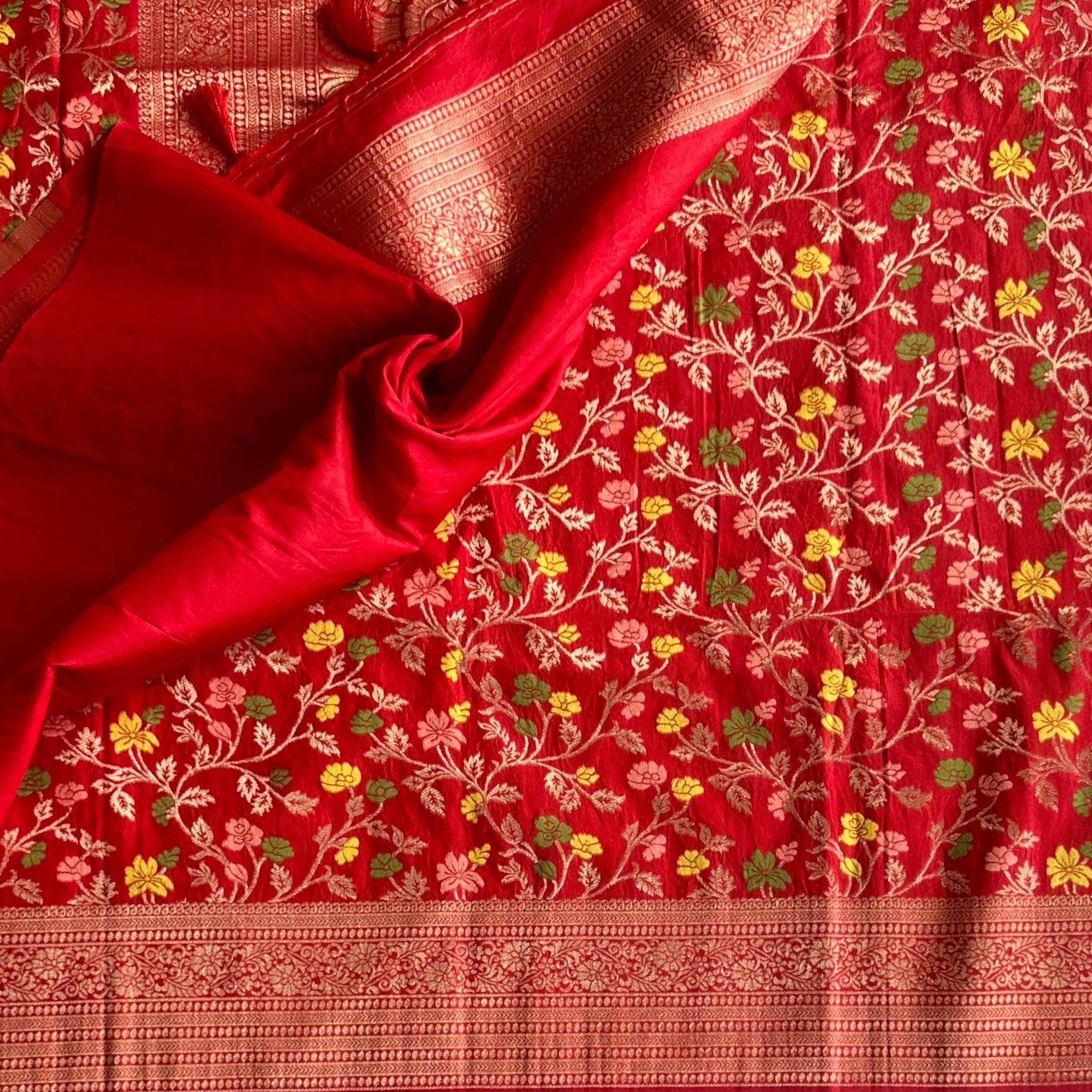 Lustrous Red Meenakari woven tussar with floral weave all over