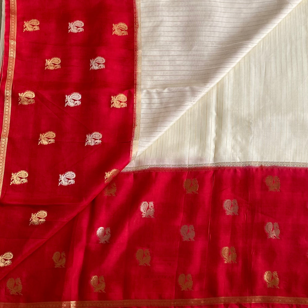 Ivory Soft Crepe Silk With Crimson Red Pallu & Peacock Long Borders