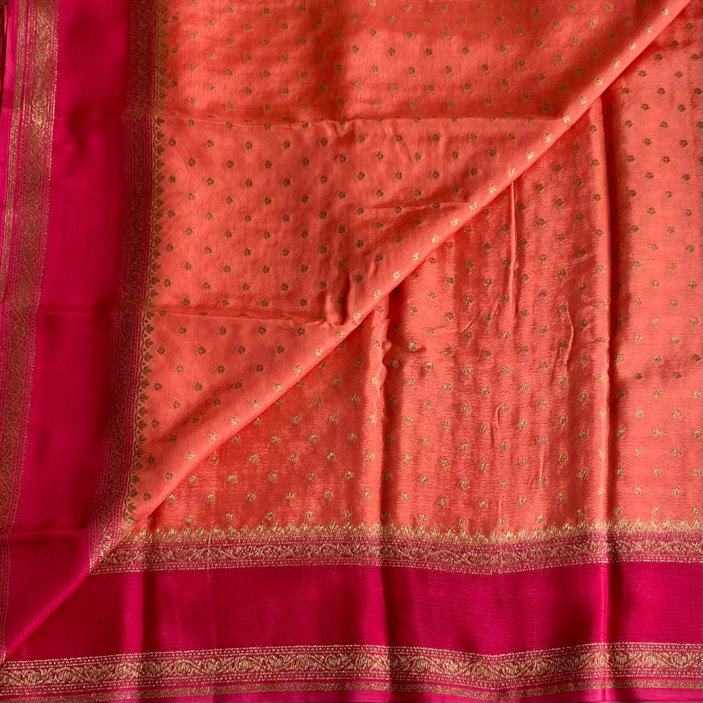 Coral Peack Banarasi Crepe Silk Saree With Rani Pink Pallu