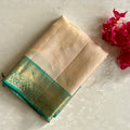Pastel Beige Designer Pure Silk Saree With Sea Green Pallu