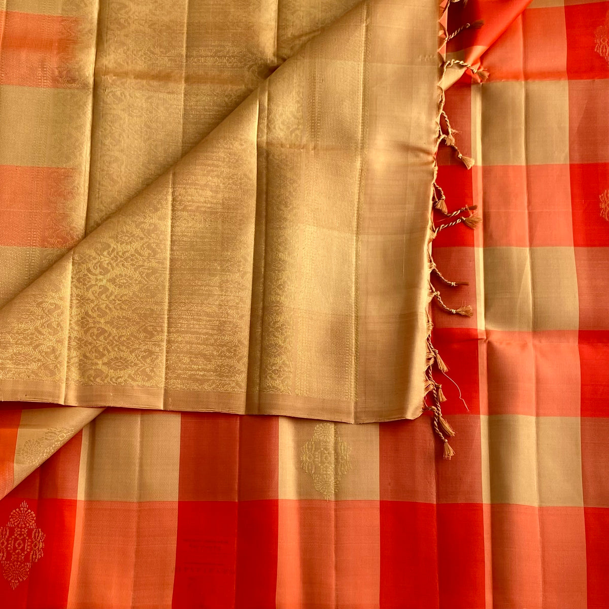 Vibrant Shades Of Orange Designer Pure Silk Saree With Golden Beige Checks