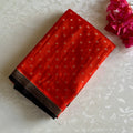 Bright Orange Kanjeevaram Pure Zari Silk Saree With Jet Black Pallu