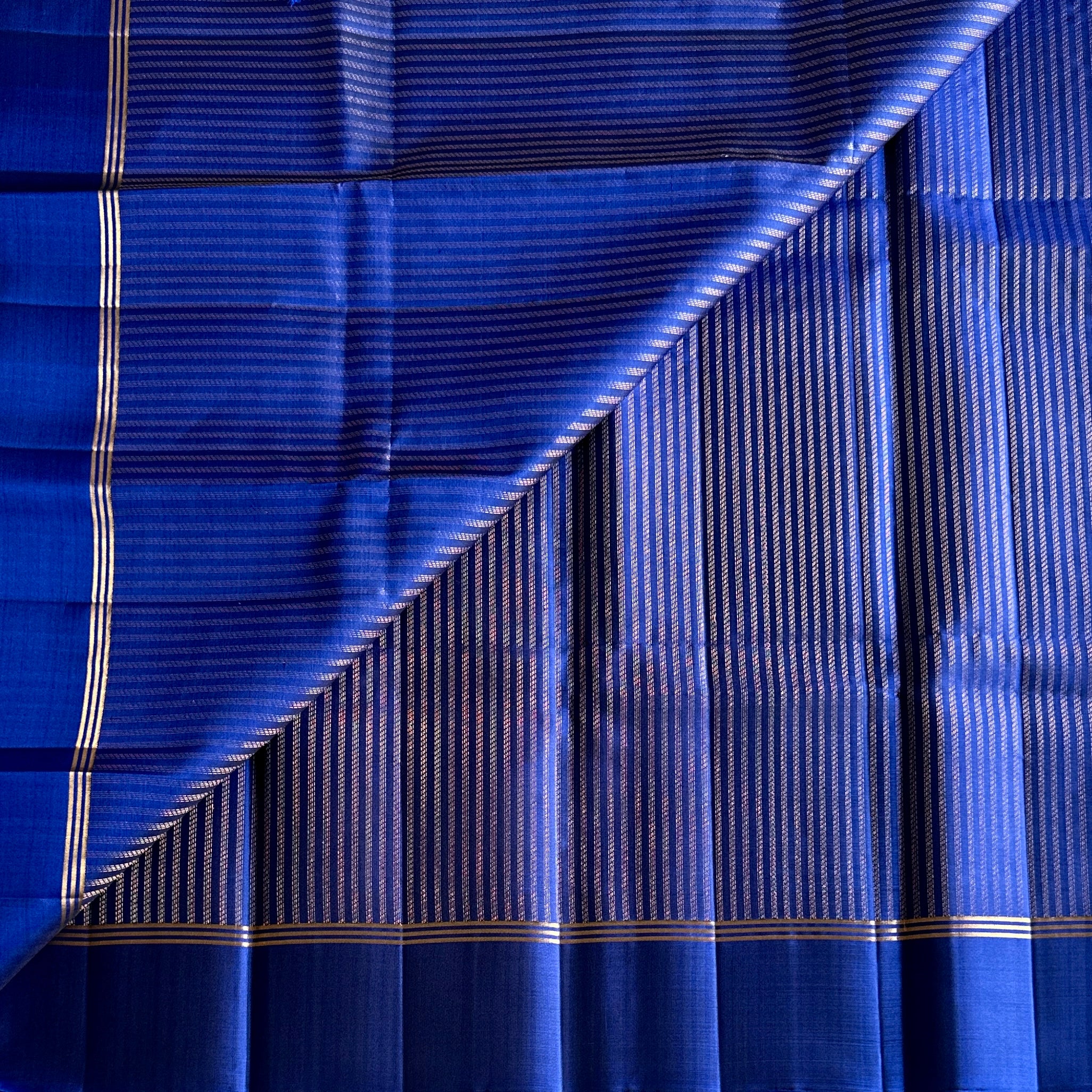 Cobalt Blue Zari Striped Saree With Gold Border And Tassels