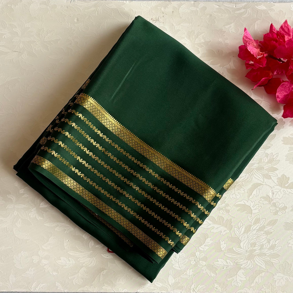 Deep Teal Saree with Gold Zari Stripes and Patterned Border