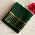 Deep Teal Saree with Gold Zari Stripes and Patterned Border