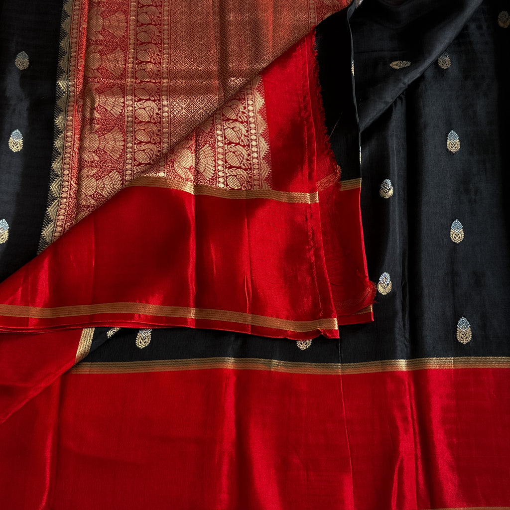 Black with exotic red jute tussar with antique designer zari weave