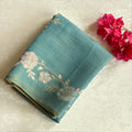 Teal Floral Embroidered Saree Gold Zari Tassel Edges Elegant Festive