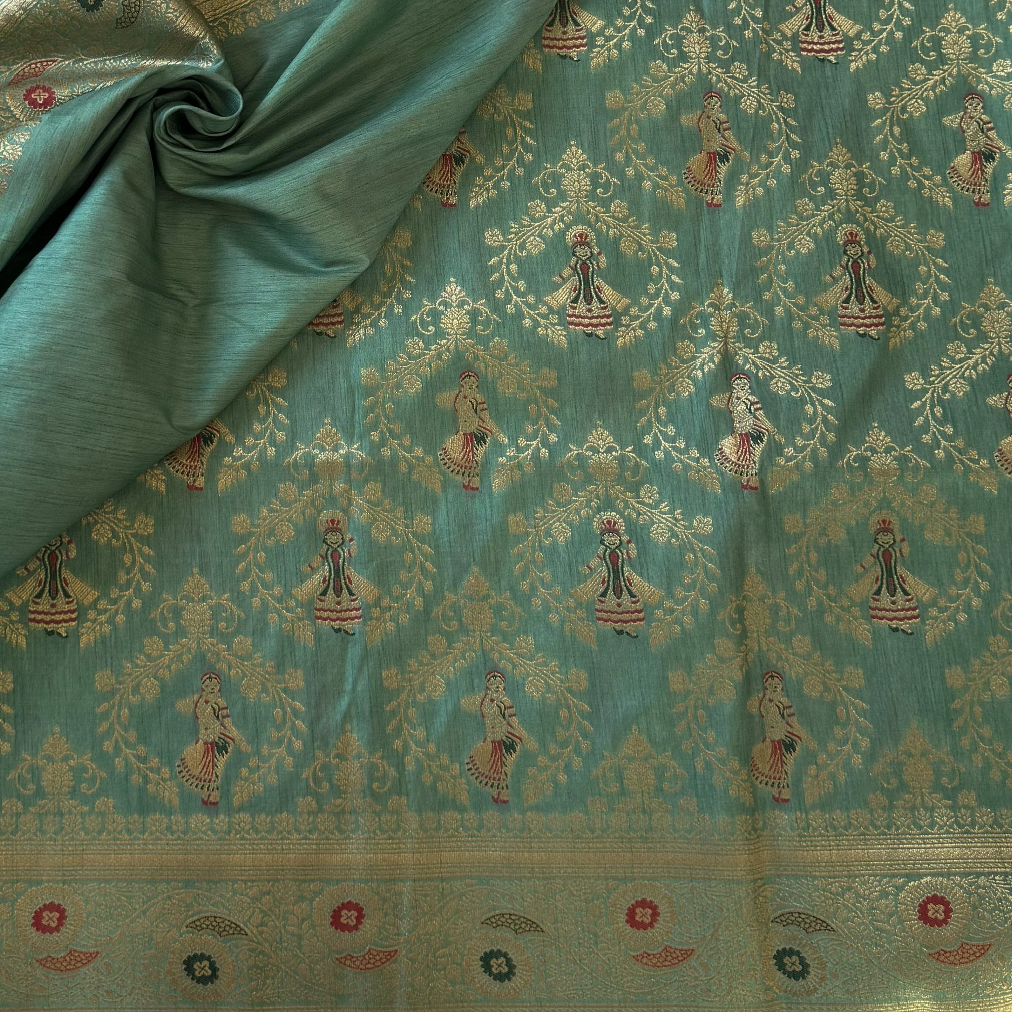 Sea Green Silk Brocade Saree with Gold Zari and Tassels