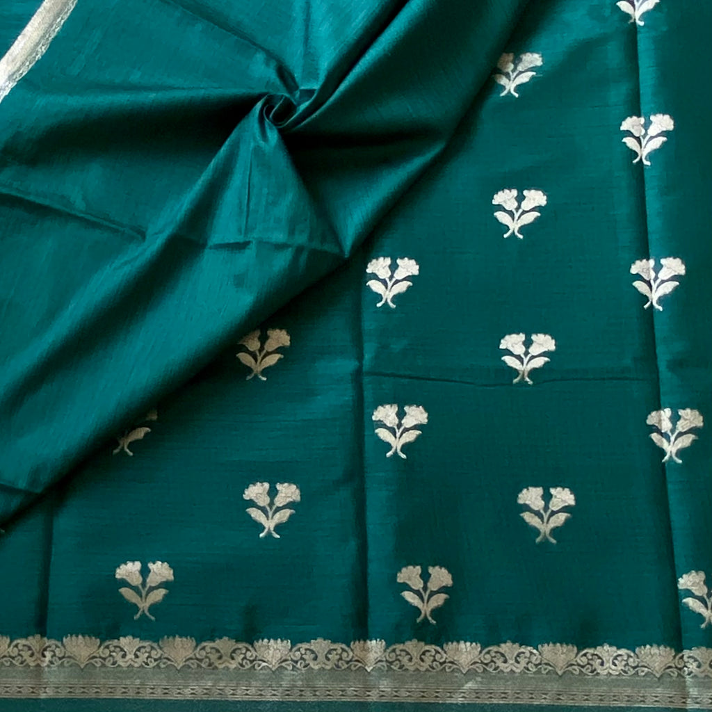 Emerald Green soft tussar with antique silver buttas and lotus borders