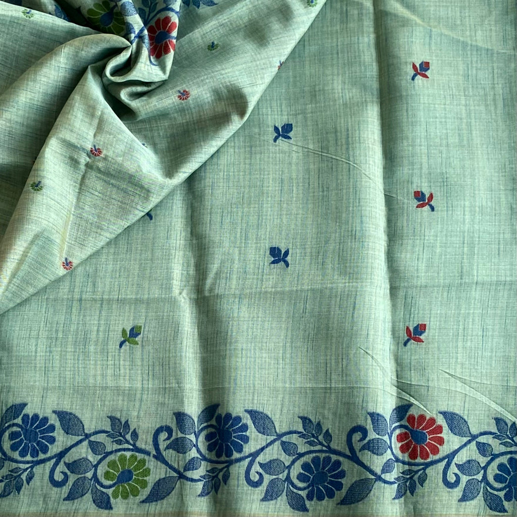 Dual shaded Sea Green Soft Tussar Silk Saree With Navy Blue Floral Border