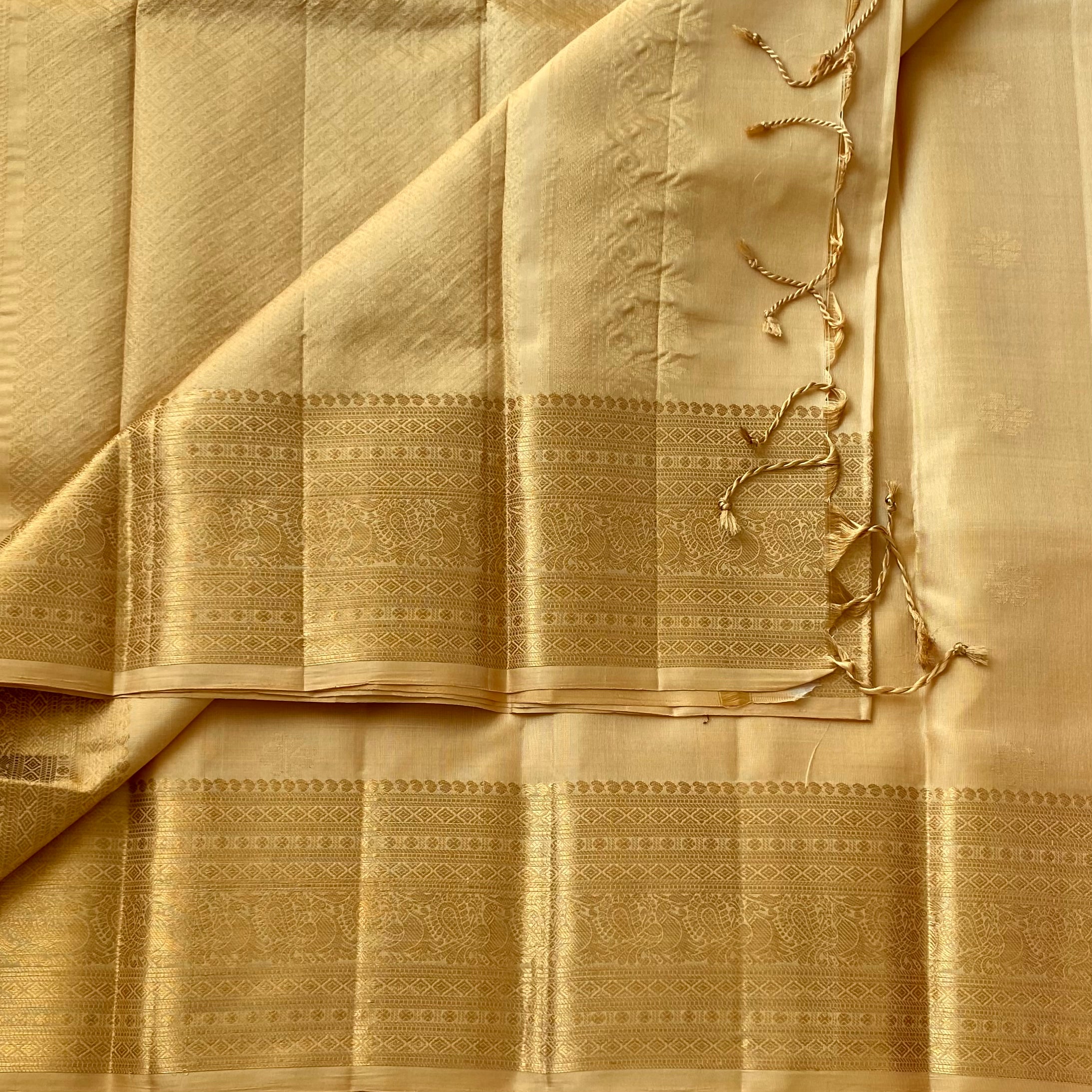 Traditional Champagne Gold Woven Zari Saree With Intricate Jacquard Border