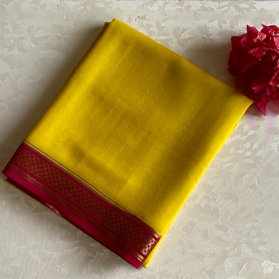 Mustard Yellow Mysore Crepe Silk Saree With Rani Pink Border