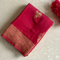 Peachish Pink Soft Crepe Silk Saree With Gold Zari Border & Wine Blouse