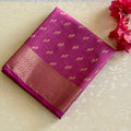 Magenta Brocade Saree with Metallic Gold Pallu Tassel Border Traditional