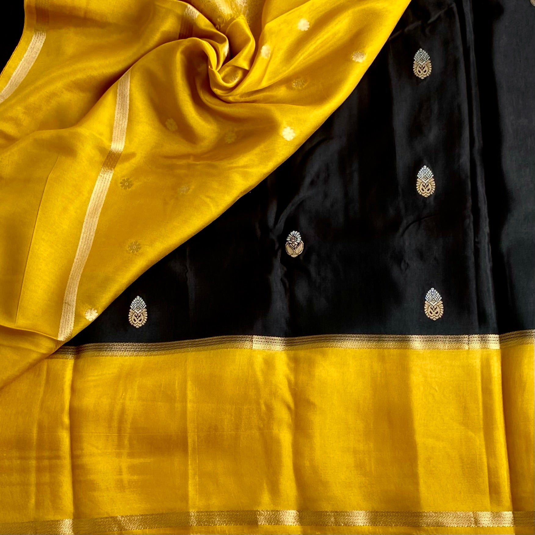 Exotic Black With Yellow Soft Tussar Silk With Antique Zari Buttas