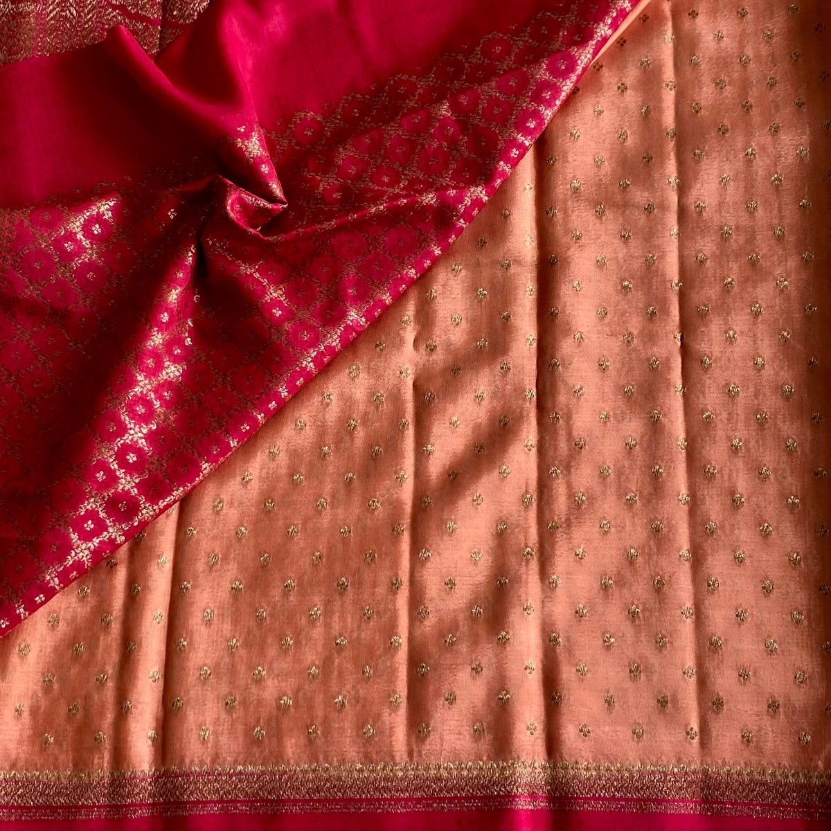 Blush Peach Banarasi Crepe Silk Saree With Rani Pink Pallu And Gold Zari