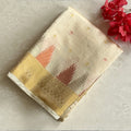 Ivory with gold zari soft tussar silk with temple borders